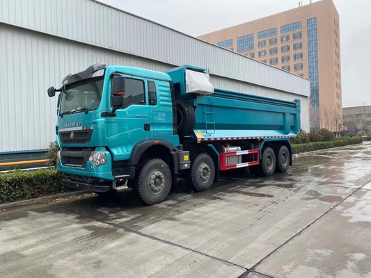 Gebruikte Sinotruk HOWO 8X4 12 banden 400 pk 30m3 zware vrachtwagen met 20cbm emmer