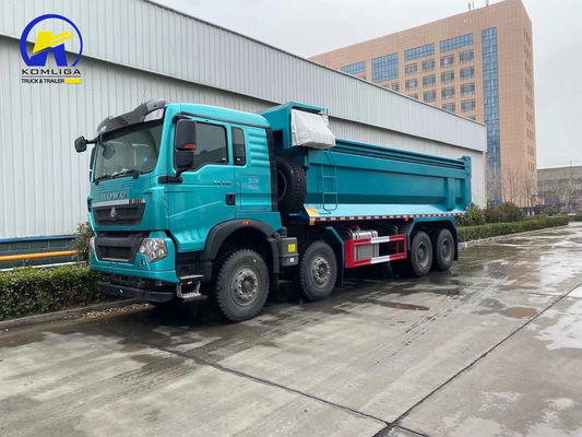 Tweedehands Sinotruck HOWO 8X4 40-50 Tonnen Dump Tipper Truck met 300L Tanker