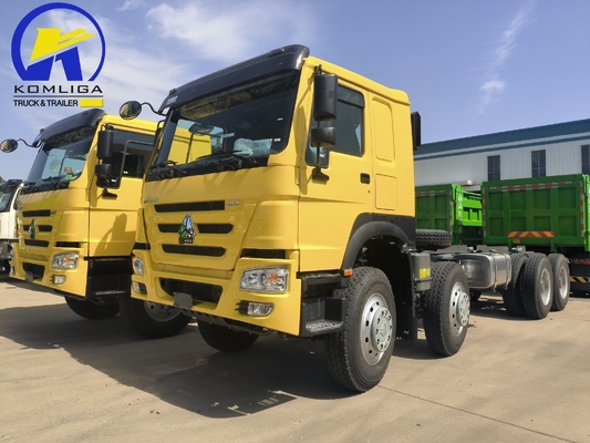Sinotruk HOWO T7 8X4 400 pk zware aanhangwagen trekker vrachtwagen met 5600X2300X1500 emmer