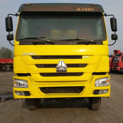 Sinotruk HOWO 8X4 371HP tweedehands gele dumptruck met handgeschakeld type