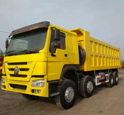 Sinotruk HOWO 8X4 371HP tweedehands gele dumptruck met handgeschakeld type