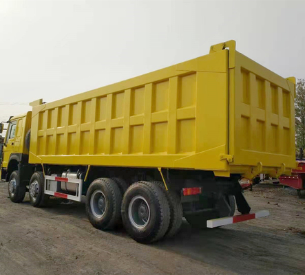 Sinotruk HOWO 8X4 371HP tweedehands gele dumptruck met handgeschakeld type