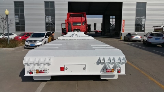 2-5 Assen Sinotruk Halve aanhangwagen met laagbed met landingsgestel 30-100t Capaciteit 12 banden